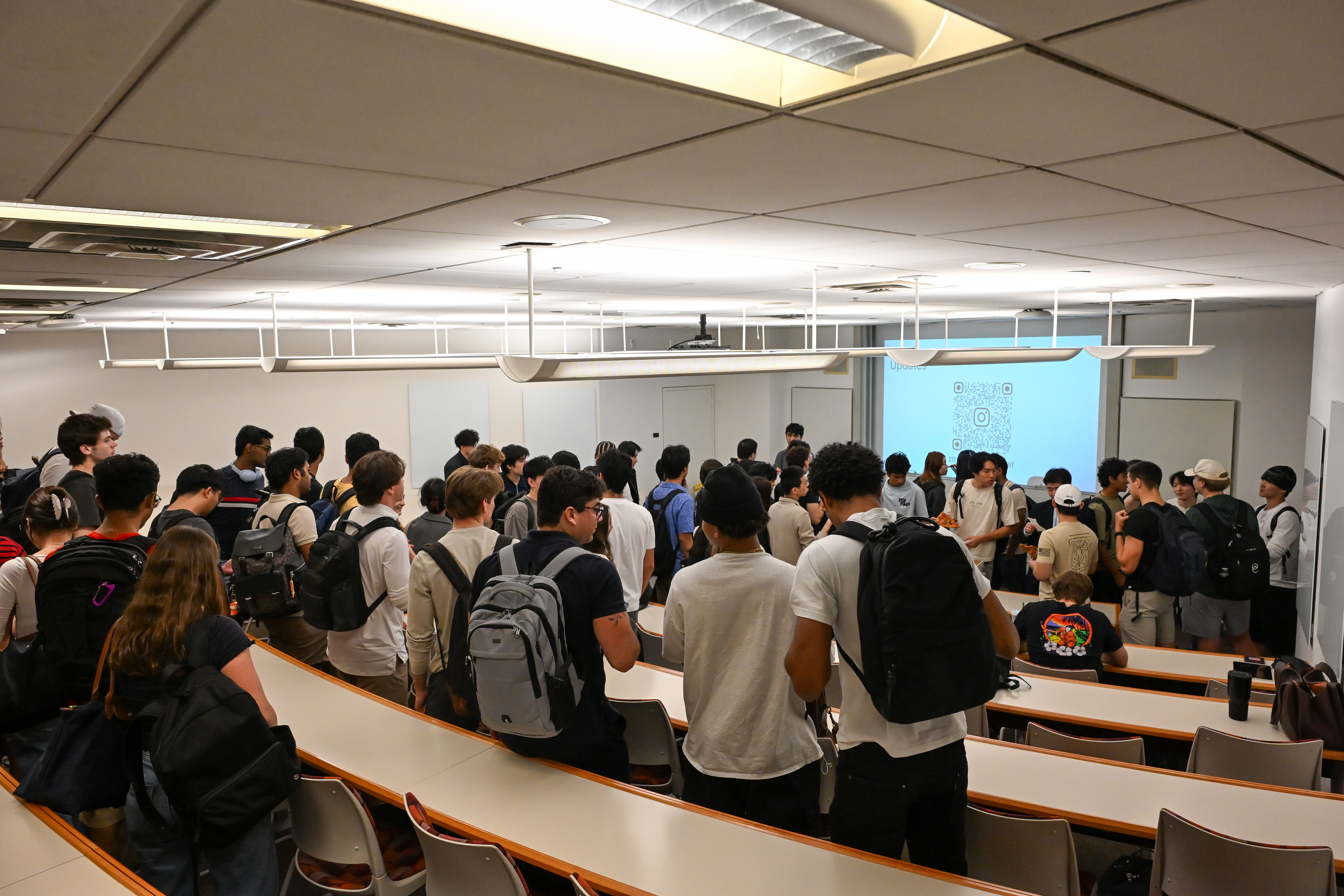 Students attending a session in an NYU classroom